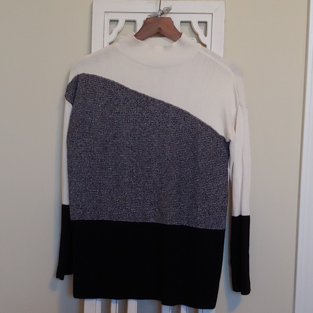 Small long sleeved sweater